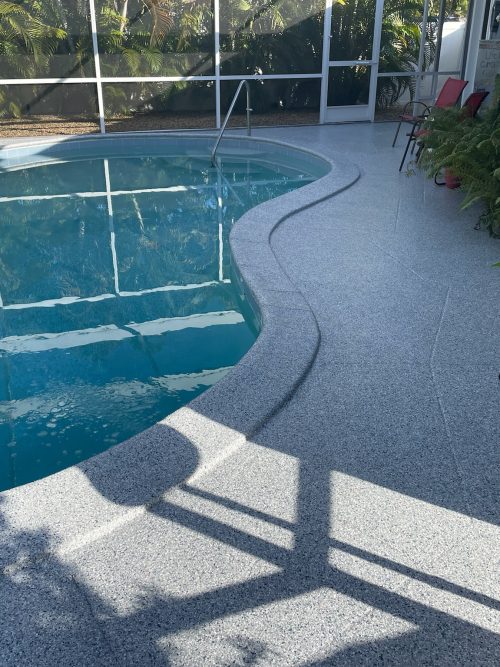 Completed Grey, Blue, and Black Flake Garage Flooring