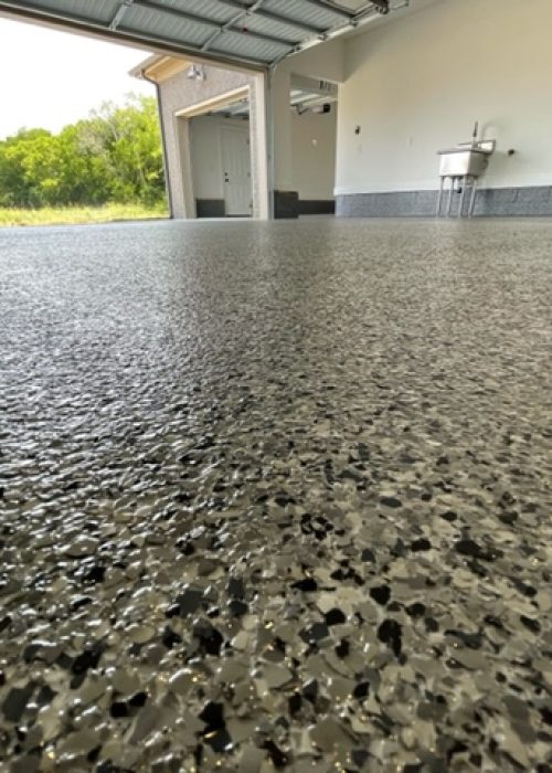 Completed Grey and Black Flake Garage Flooring